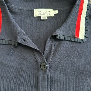 Molly Bracken Dark Blue Polo with Red and White Trim